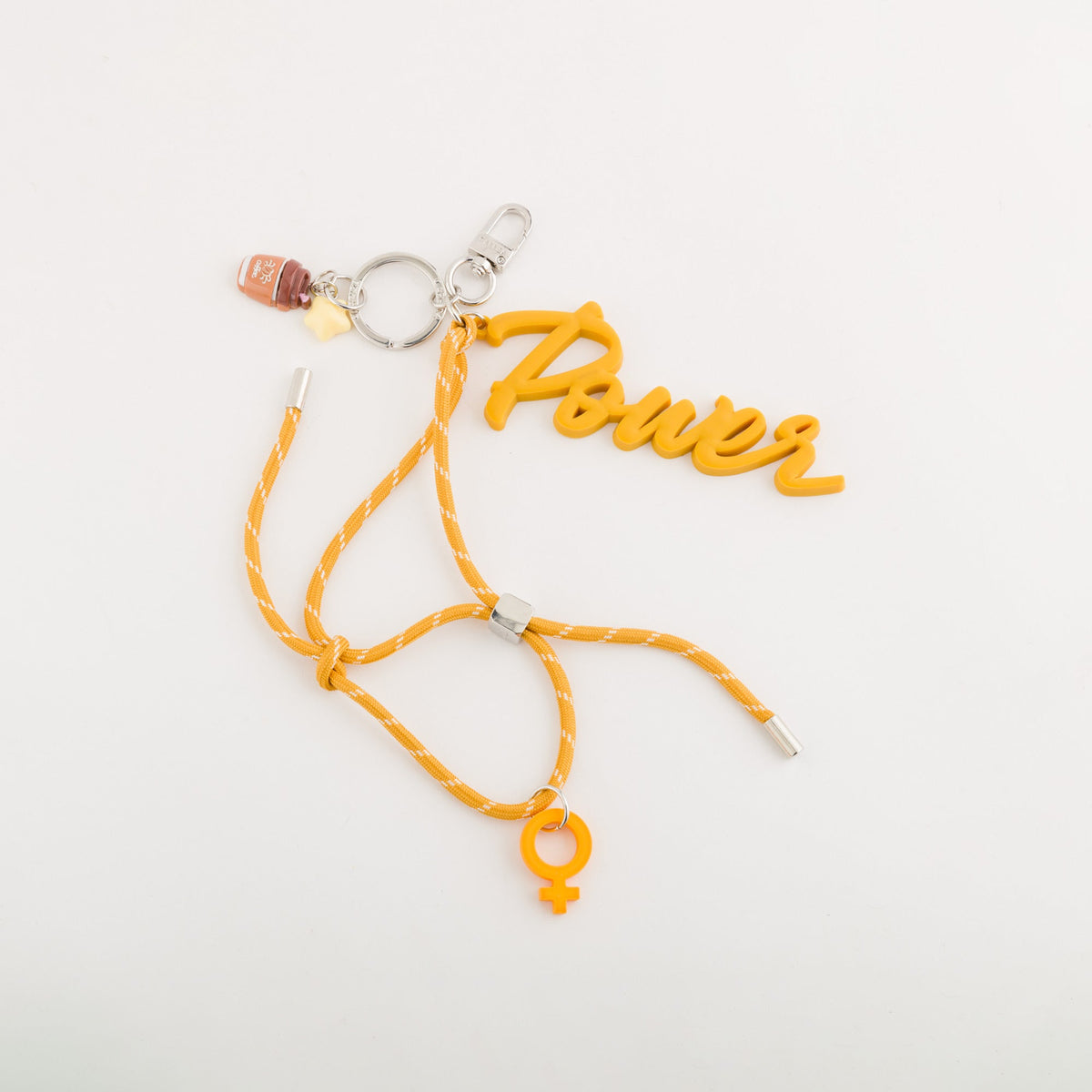 Carpisa Crna Gora – Girl power keychain - Women's keychain – Mustard – AKD48101546 – Image 1